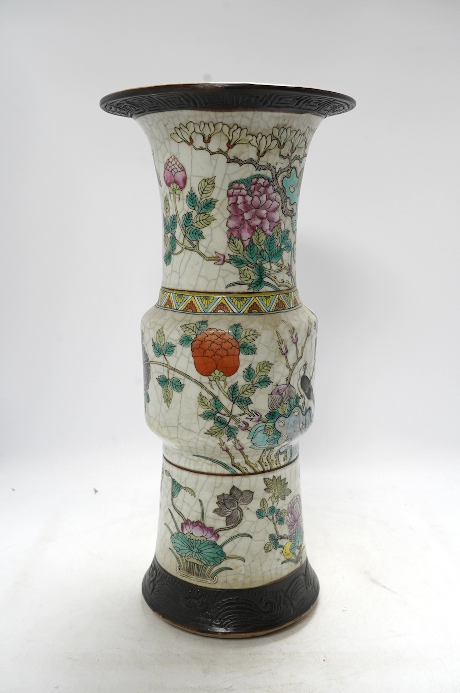 A large Chinese famille rose crackle gu vase, early 20th century, 44.5cm high. Condition - has hole to base where possibly used as a lamp, rest of lamp good